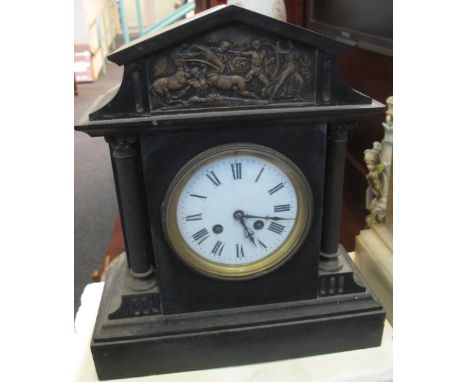 Late 19th/early 20th Century black slate two train architectural mantel clock with enamel Roman face. (B.P. 24% incl. VAT)