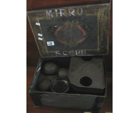 Mirroscope magic lantern type projector with lens in original card box. (B.P. 24% incl. VAT)