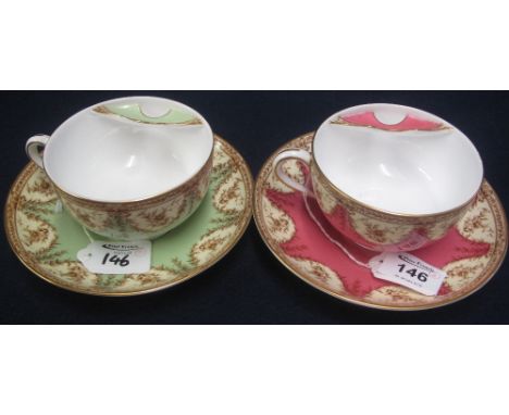 Similar pair of Royal Worcester porcelain moustache cups and saucers with printed foliate decoration. Printed marks to base w