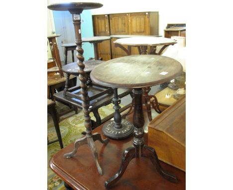 19th Century mahogany oval tilt top tripod table, together with a smokers stand and an oak jardiniere stand on barley twist s