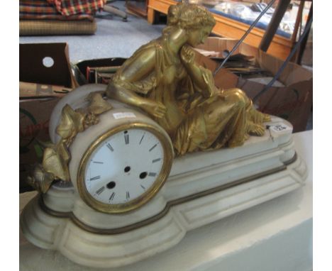19th Century Ormolu and white marble two train figural mantel clock, the case surmounted by a reclining pensive female figure