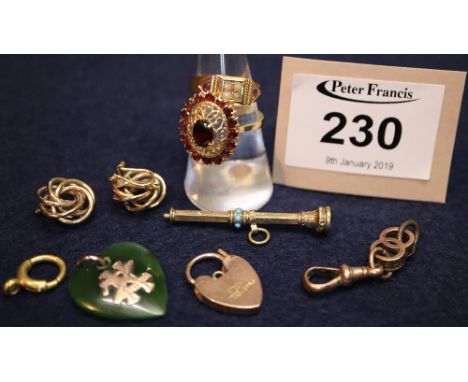 Collection of gold and yellow metal items including: a pearl and ruby ring, a garnet ring, jade heart, earrings, padlock, sma