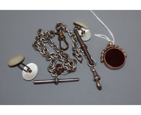 A yellow metal and chalcedony spinning fob seal, a pair of mother of pearl cufflinks and a silver albert.