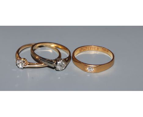 Three solitaire diamonds ring, one 22ct, one 18ct and one yellow metal.
