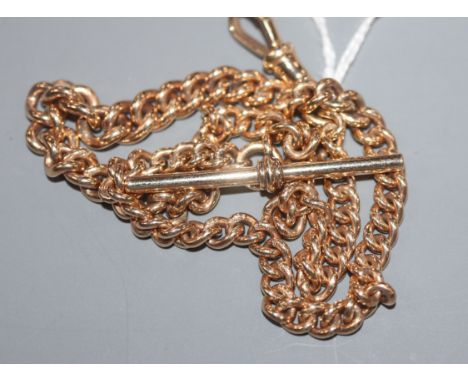 A 9ct gold curb-link watch chain, 33.3cm, 27 grams.