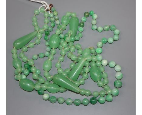 A single strand graduated jade bead necklace with 9ct gold clasp and a green paste necklace.