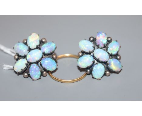 A pair of white metal and white opal cluster floral earrings and a small 22 ct gold band.