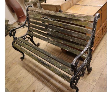 A garden bench and two bench ends Bench W.125cm