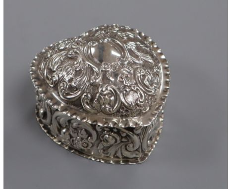 A late Victorian repousse silver heart shaped trinket box, William Hutton &amp; Sons Ltd, London, 1896, 91mm.