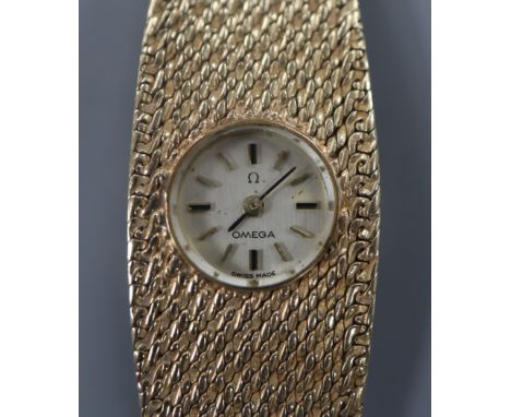 A lady's 1960's 9ct Omega manual back wind bracelet watch, approx. 17cm.