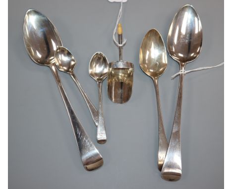 A George III silver shovel-shaped caddy spoon and sundry George III silver flatware, including a pair of Old English pattern 