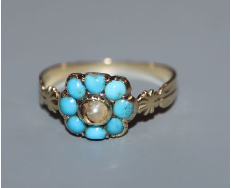 A Victorian yellow metal, turquoise and seed pearl cluster ring, size I.