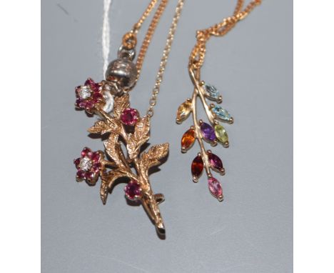 A 9ct gold, ruby and diamond set floral spray brooch and a 9ct gold and gem set pendant on a 9ct gold chain, brooch 37mm.
