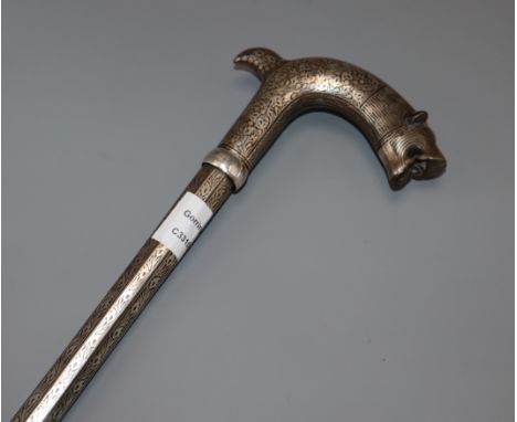 A 19th century bidri ware mahout elephant tamer's stick, with tiger's head handle and decorated with foliate motifs, 37in.Pro