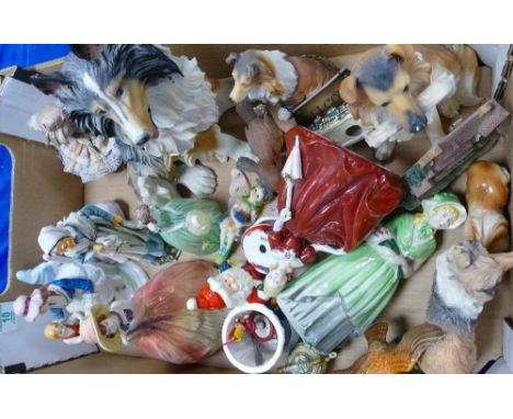 A collection of ceramic &amp; resin figures to include: dogs, lady figures, orniments etc 