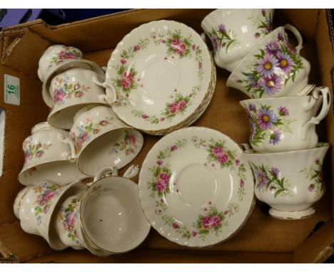 A mixed collection of items to include: Royal Albert cups &amp; saucers moss rose pattern, nichaelmas daisy etc ( 1 tray) 
