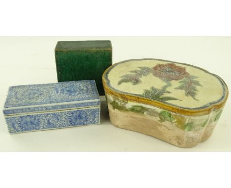 A Chinese oval glazed ceramic stand, width 26cm, a blue and white porcelain box and a green glazed ceramic brick, (3).