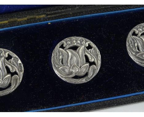 A cased set of 6 silver buttons, by William Hutton & Sons, Birmingham 1902, diameter 26mm.