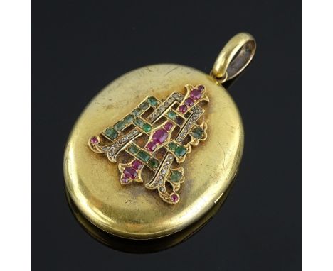 A 19th century ruby, emerald and diamond photo locket, unmarked gold settings, height excluding bale 39.3mm, 24.3g.