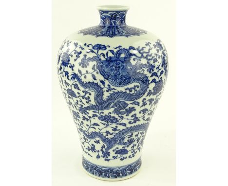 A Chinese blue and white porcelain narrow necked vase, hand painted dragon and blossom designs, seal mark under base, height 