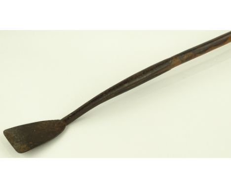 A Zulu hardwood knobkerry handled stick with integral iron hoe implement.