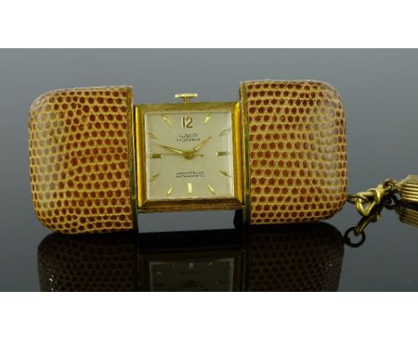 A goldplated and leather cased Laco travelling clock, 17 jewel movement with folding kick stand, closed case width 53.2mm, wo