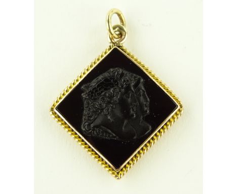 A fine quality double-sided carved Cornelian Intaglio and relief pendant, depicting classical portraits, unmarked settings te