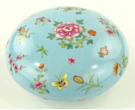 A Chinese blue glazed porcelain circular box and cover, hand painted butterflies and blossom, painted seal mark under base, d