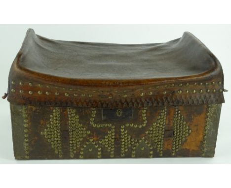 A rare 19th century American leather saddle topped stage coach trunk, brass studded decoration with leather carrying handles,