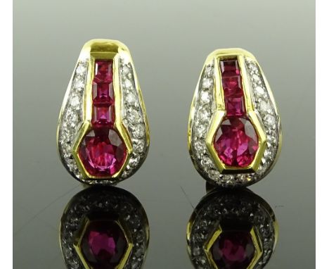 A pair of 18ct gold ruby and diamond cluster stud earrings, height 15mm, 6.4g.
