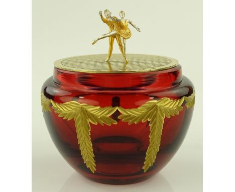 Theo Faberge gilded and engraved ruby glass pot with gilded silver lid surmounted by ballet figures, height excluding figures
