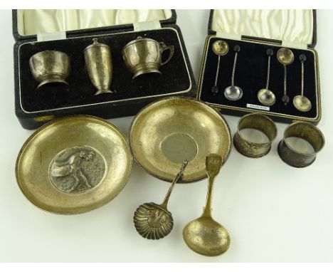 A group of silver items, including 2 caddy spoons.