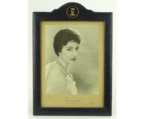 A studio photograph portrait of Princess Margaret, signed and dated 1958, also signed by Cecil Beaton (photographer), in orig