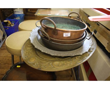 Three copper jam pans, two brass chargers, a mahogany tripod wine table and four folding garden chairs