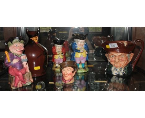 Two Royal Doulton character jugs and a ewer reg no. 436947, a Melba ware Toby jug of Punch and two other Toby jugs (6)
