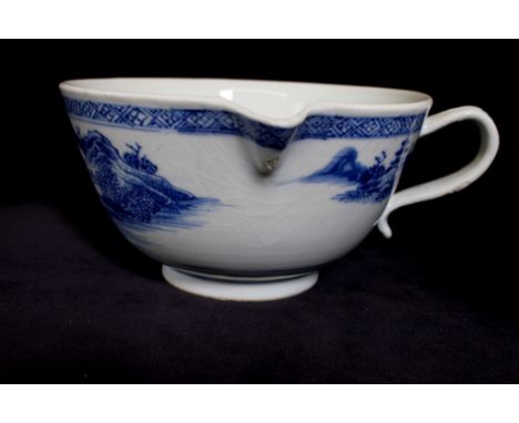 Nanking cargo: blue and white milk pourer, depicting a Pagoda and fisherman with Christie's and R&G McPherson labels, 15cm di