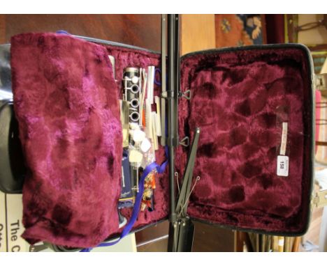A Rosehill clarinet, no. 710320, with Vandoren mouthpiece and reeds, cased, music stand and practical tutor book