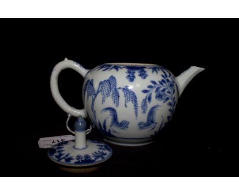 A Chinese blue and white teapot and cover, depicting fighting cocks, with R&G McPherson label and dated to Yongzheng period, 