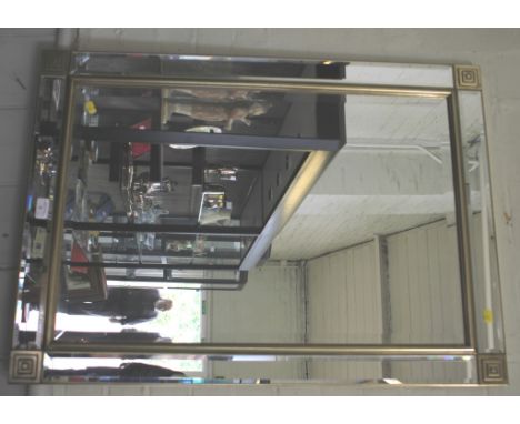 A silver coloured painted wall mirror, the bevelled plate with bevelled plate borders, 90cm x 65cm