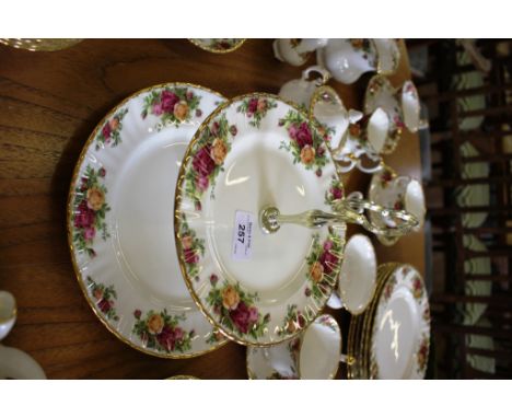 A Royal Albert part dinner and tea service, Old English Rose pattern, including cake stand and dinner plates