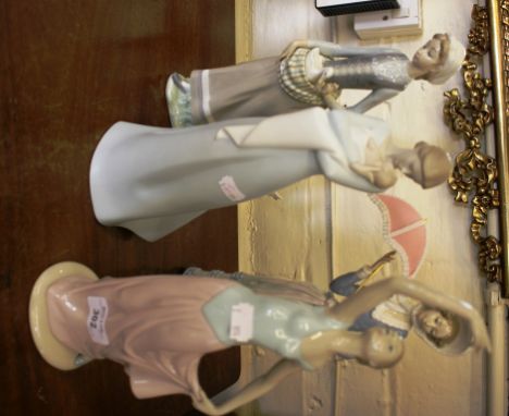 Three Lladro figures of ladies, A Mother's Embrace, Damita Aranjvez, En El Corral, all boxed, 31cm high, and a Nao figure of 