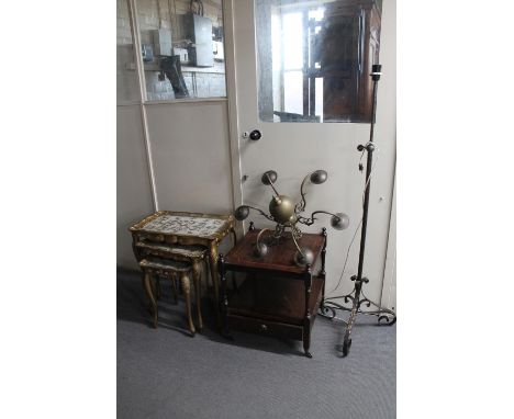 A nest of three gilt wood tables, two tier table, brass chandelier and a wrought iron standard lamp 