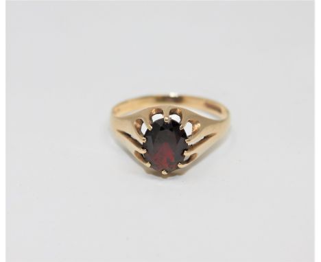 A 9ct gold garnet set ring, size V CONDITION REPORT: 2.4g