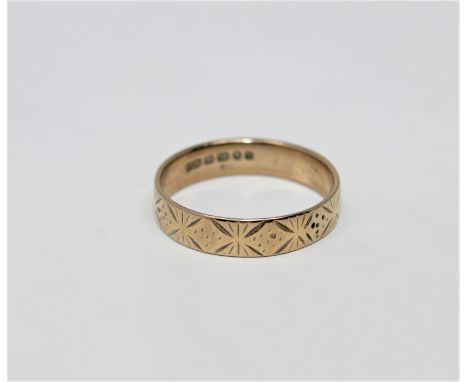 An 18ct gold band ring, size Q1/2 CONDITION REPORT: 3.7g. In good condition. 