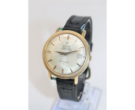 A gent's gold plated and stainless steel Omega Constellation automatic centre seconds calendar wristwatch, silvered dial with