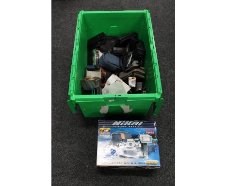 A large box of vintage cameras 
