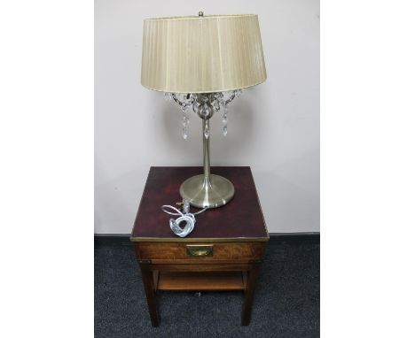 A mahogany ship's style lamp table with brass mounts together with a table lamp and shade 