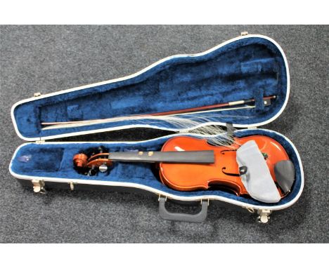 A modern violin and bow in fitted hard case 