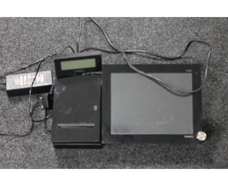 A Casio V-R200 digital hand touch till with key fob
