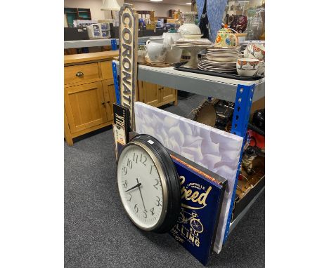 A battery operated wall clock, assorted signs, five wall canvases 